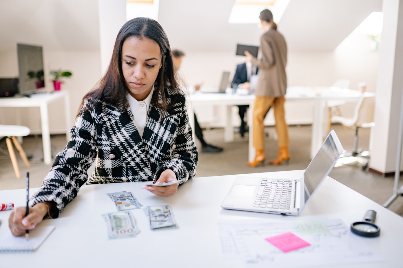 Employee checks petty cash log